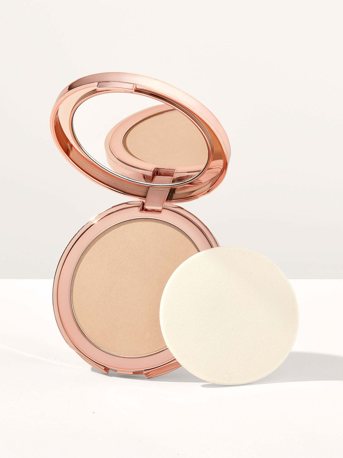 smooth operator TM Amazonian clay tinted pressed finishing powder